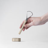 manadental tongue scraper.